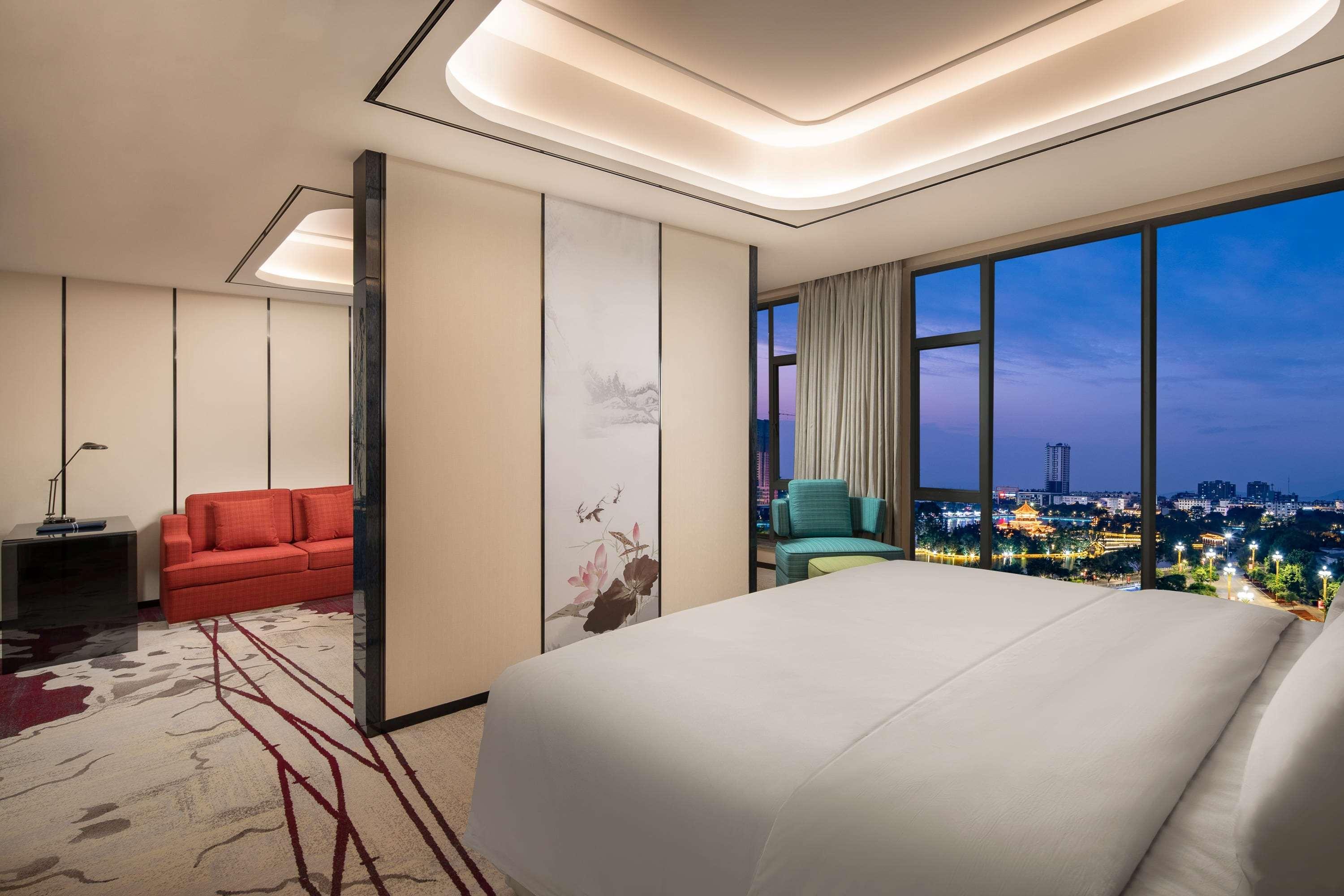 Ramada By Wyndham Mengzi Suites Экстерьер фото