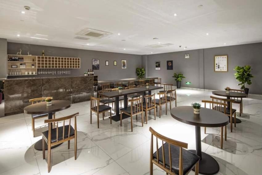 Ramada By Wyndham Mengzi Suites Экстерьер фото